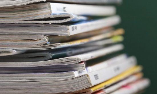 Photo showing a pile of journals 