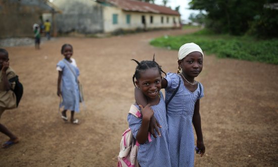 School children walking in Guinea 