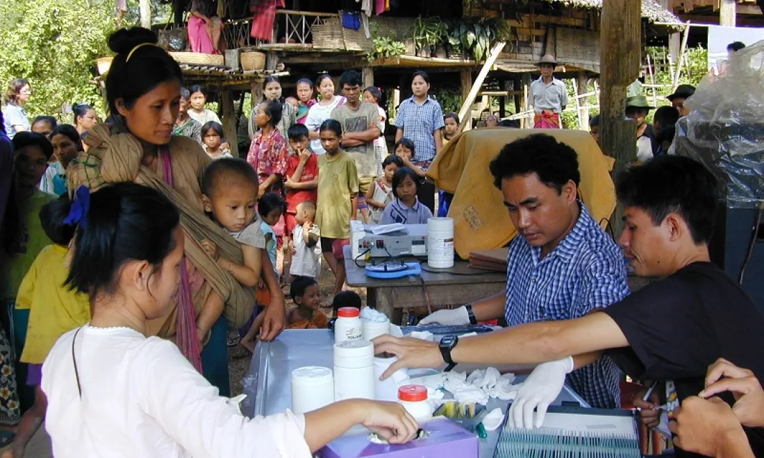 villagers at outdoor clinic, smru