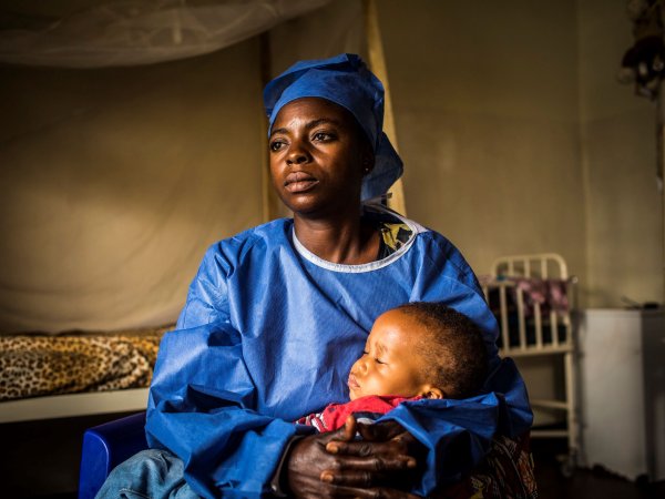 Caregiver with child at Treatment Center