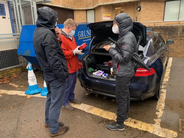 Researchers doing tests in a carpark