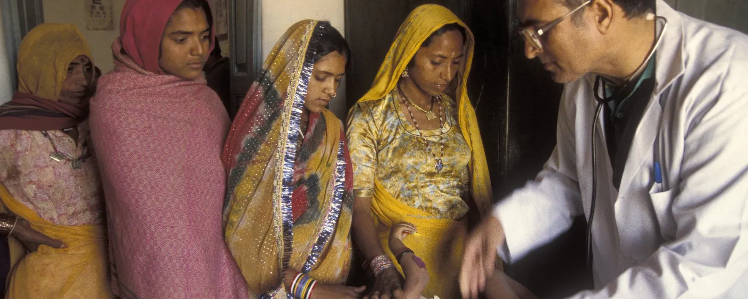 Infant patients gets a check up. India. 