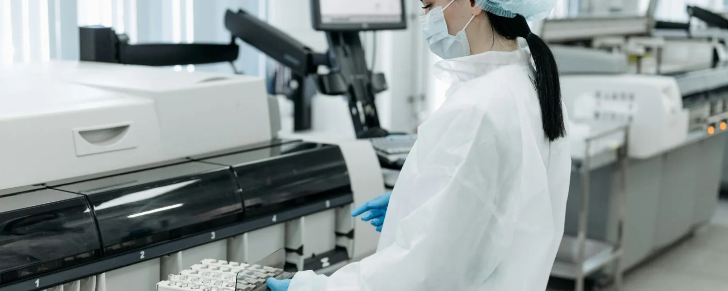 Medical Practitioner holding a Rack of Test Tube Samples
