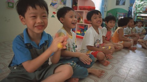 children singing in a class at a public preschool