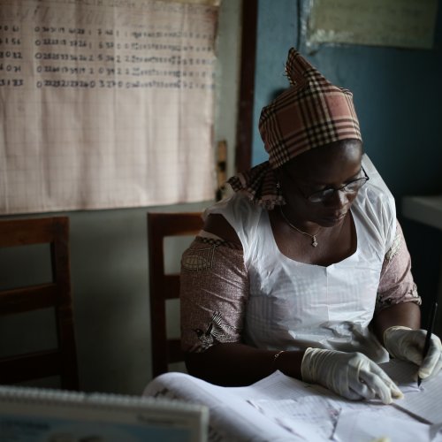 health worker writing
