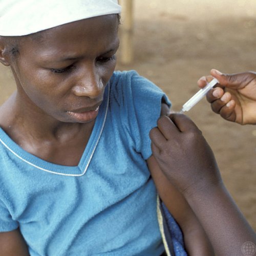 woman getting vaccinated, credit Curt Carnemark, World Bank