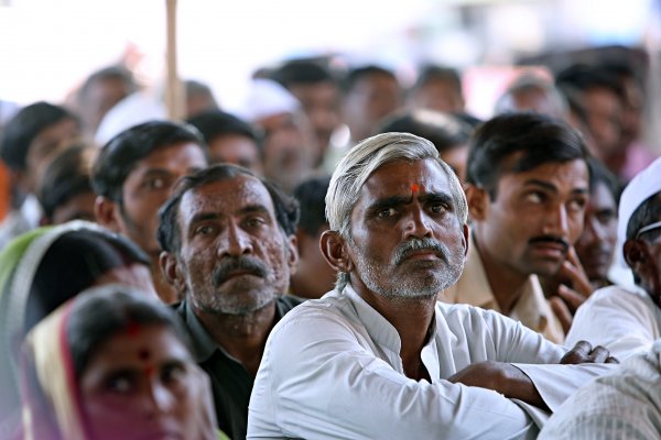 People at community meeting in India