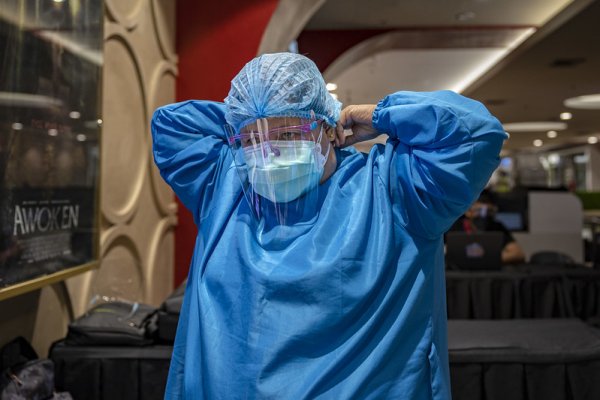 A health worker wears ppe Covid-19, Philippines. 