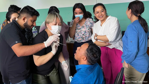 Training in collecting viral samples from the back of the mouth during a site initiation visit (SIV) of the PLATCOV and AD ASTRA clinical trials in Kathmandu, Nepal in June 2024.