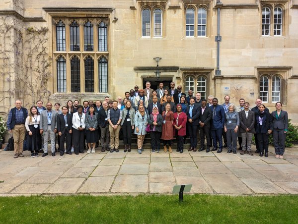 Group of people standing outside Jesus College, Oxford