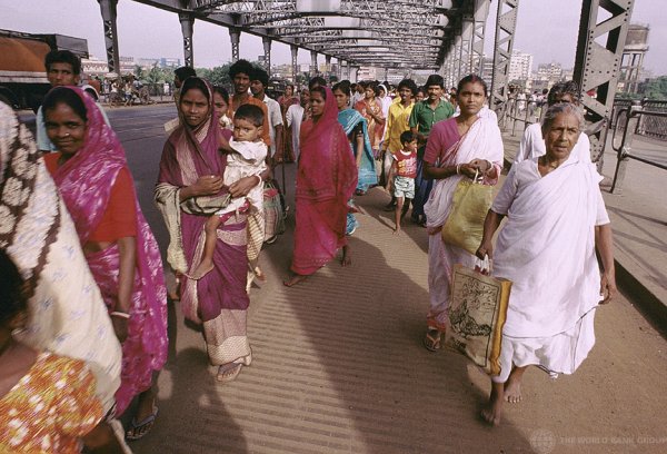 People walking roadside, India 