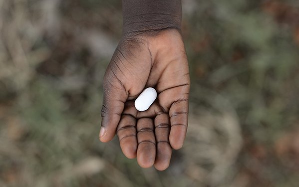 Pill in hand