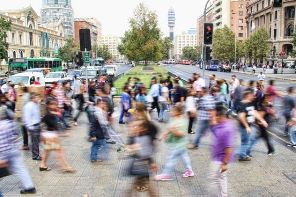 Blurred people on a busy street