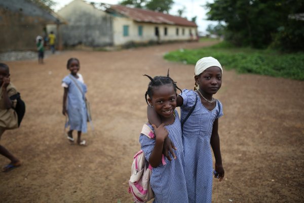 School children walking in Guinea