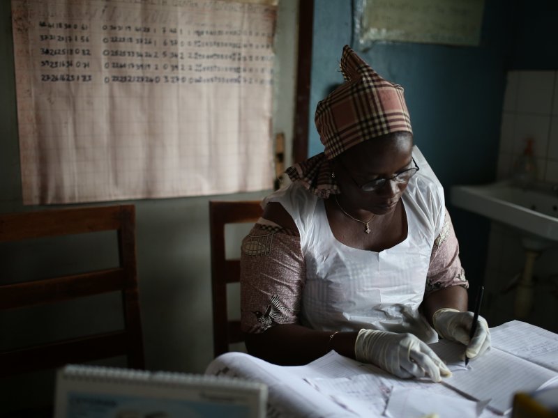 health worker writing