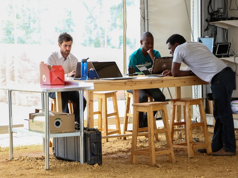 Photo of people using laptops