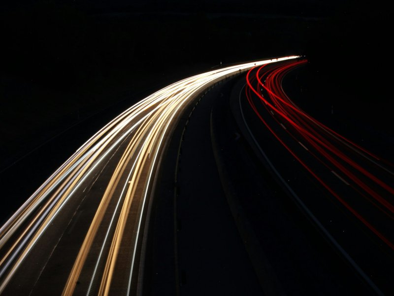 photo of long exposure road lights